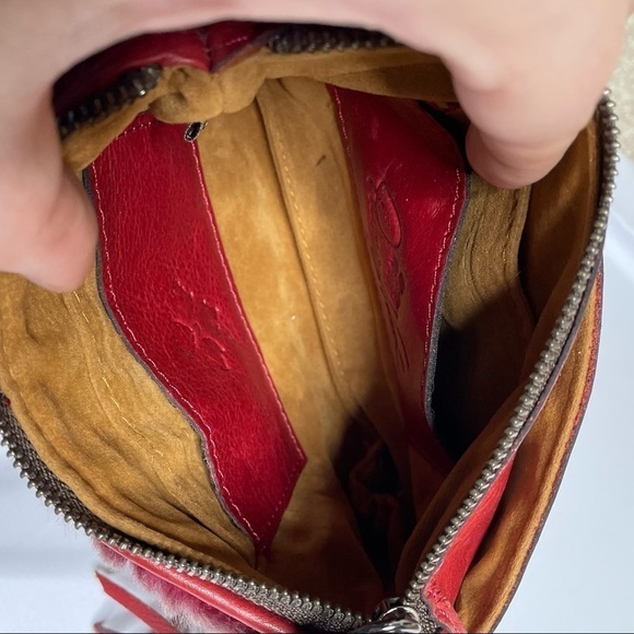 Patricia Nash Laser Cut Sherpa & Leather Wristlet In Berry Red